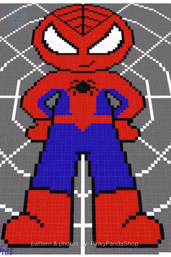 
Gemini said
A pixel-art crochet chart for a full-body Spider-Man character standing in a heroic pose against a grey background with a white spiderweb design. The bottom of the image credits the pattern and photos to PinkyPandaShop, and it is part of a crochet roundup featured on theyarncrew.com.